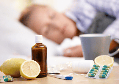 Person experiencing cold and flu symptoms like cough and congestion
