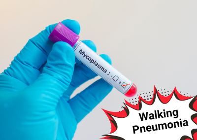 gloved hand holding a positive Mycoplasma blood test tube next to a "Walking Pneumonia" graphic.