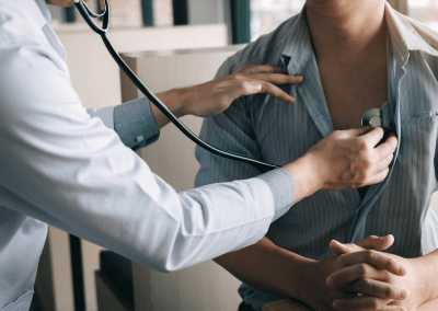 Patient completing a physical exam at an urgent care walk-in clinic
