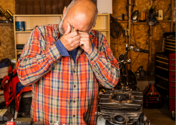 Person with an eye injury seeking treatment